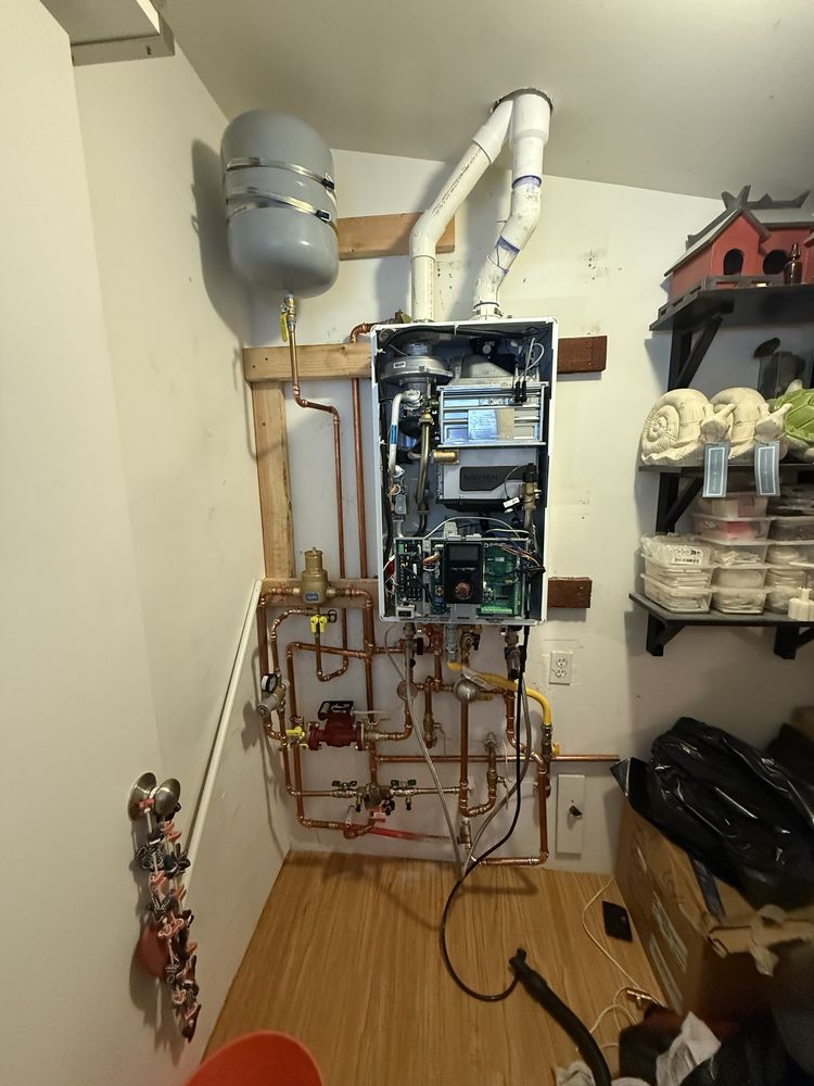 Professionally installed tankless water heater system by 5Star Plumbing Services